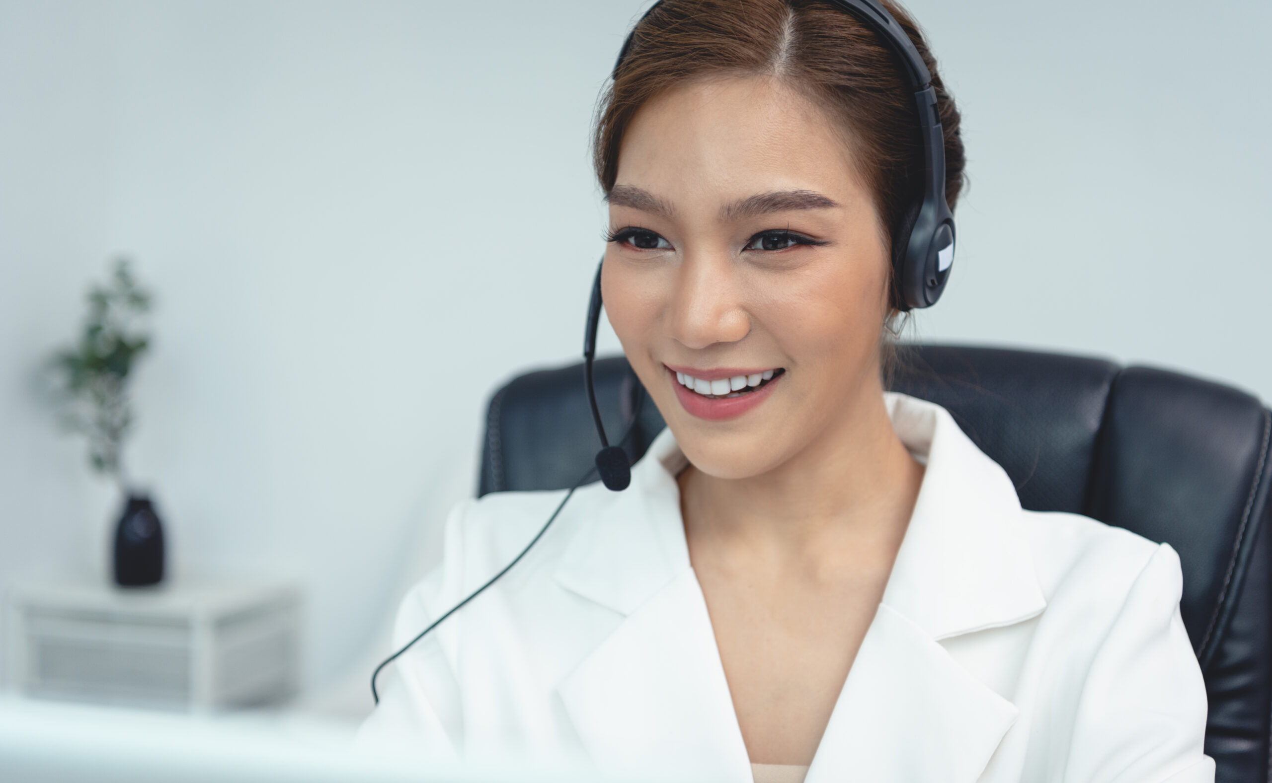 Remote Medical Office 4 asian woman call center agent with headset working 2024 12 06 22 25 51 utc scaled